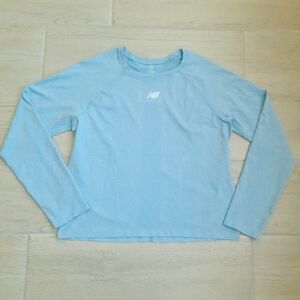 New Balance women's light blue long sleeve performance wocking top - size large